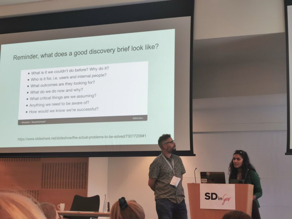 Ian and Pri present slides at sdingov