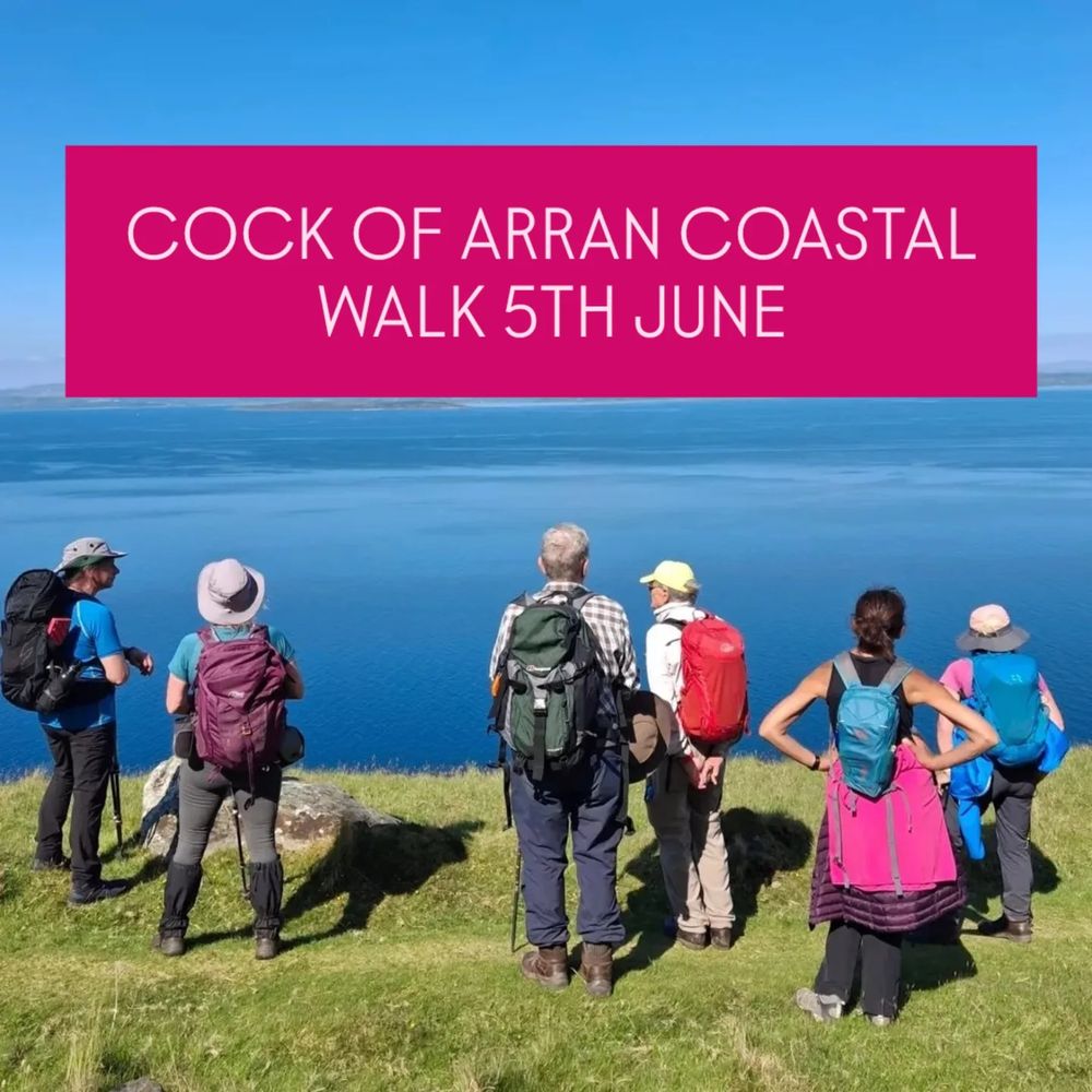 A photo of six people admiring a sea view in glorious sunshine. Above them hover the works "COCK OF ARRAN COASTAL WALK 5TH JUNE"