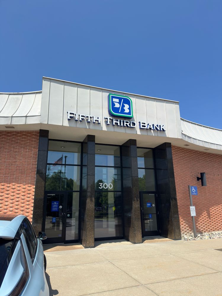 Picture of the exterior of Fifth Third (5/3) Bank, bearing a sign that says as much. Not a serious institution.