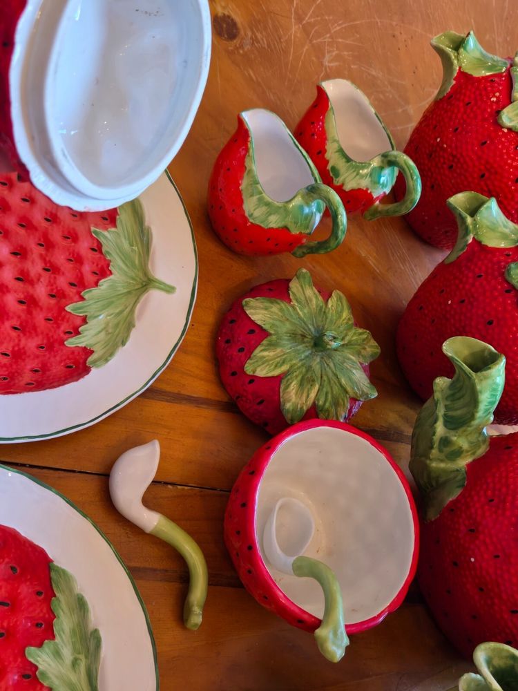 closeup of the sugar bowl and spoon which is a STRAWBERRY STEM KILL ME NOW 