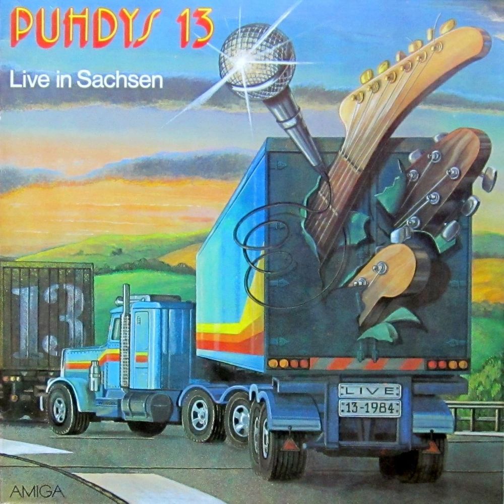 Album von den Pudhys 13
gezeichnet ist ein LKW mit Gitarren und Mikro, welche aus dem Sattelzug "brechen"