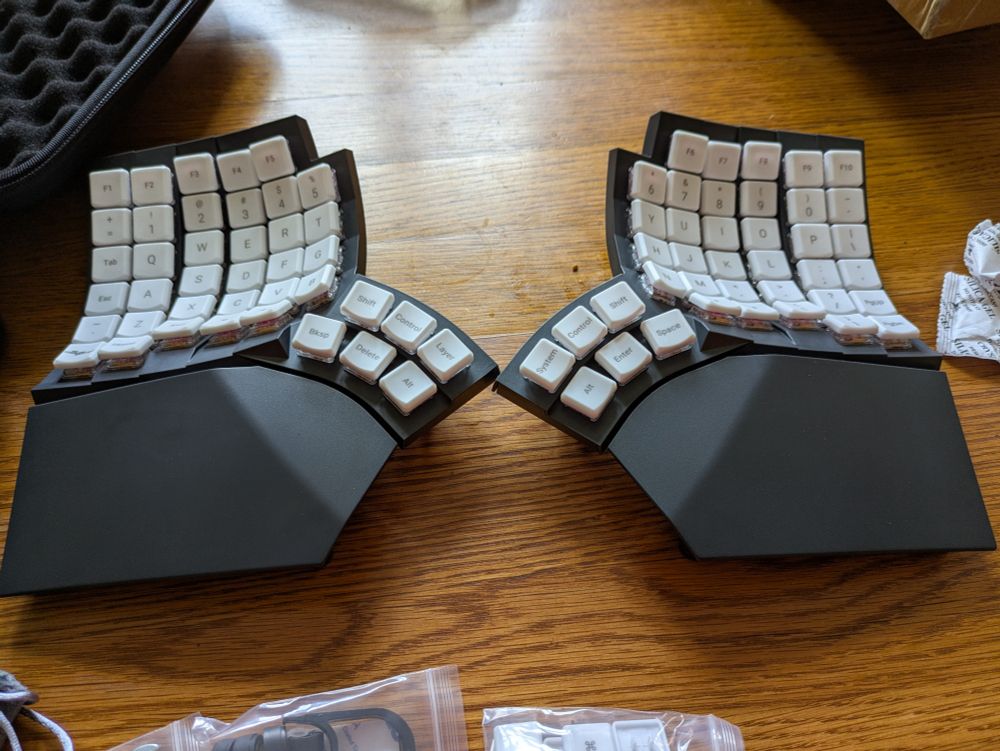 A split keyboard which each half being contoured to fit the hand. Each half also have 6 keys for the thumb. 