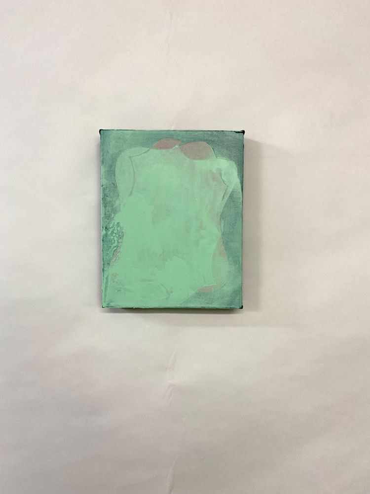 A small teal painting on a crinkled background (one must be honest in the alt text)