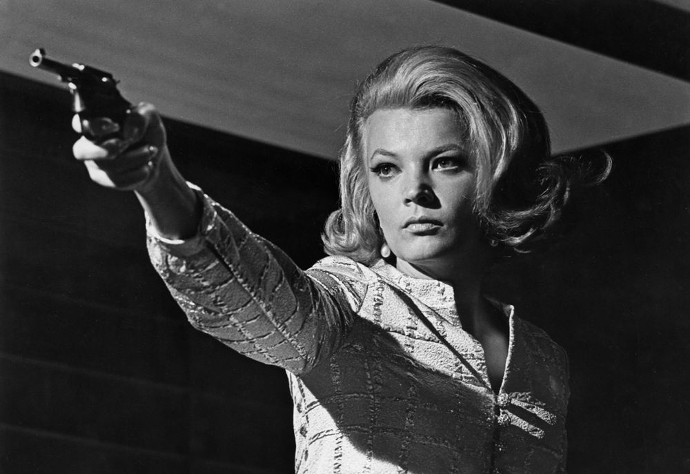 gena rowlands points a pistol