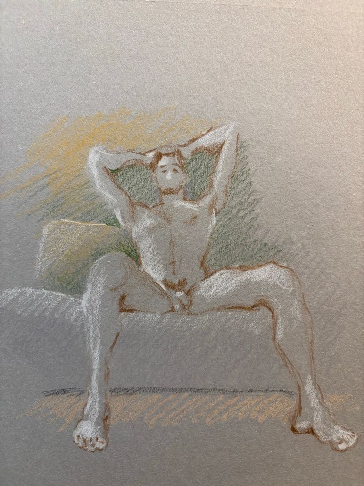 Male nude model reclining on a couch with legs spread