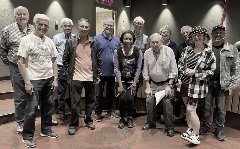 Chorus members gather for a pose.