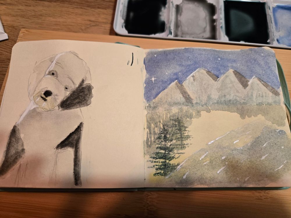 Almost finished sketches. The dog has more shading, and some highlights for where the furnis catching the sun. The mountains have stars, snow highlights on the ridges, and some white horses on the waves.