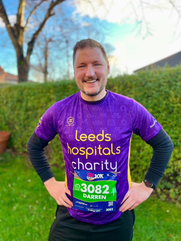 Smiling man in running outfit