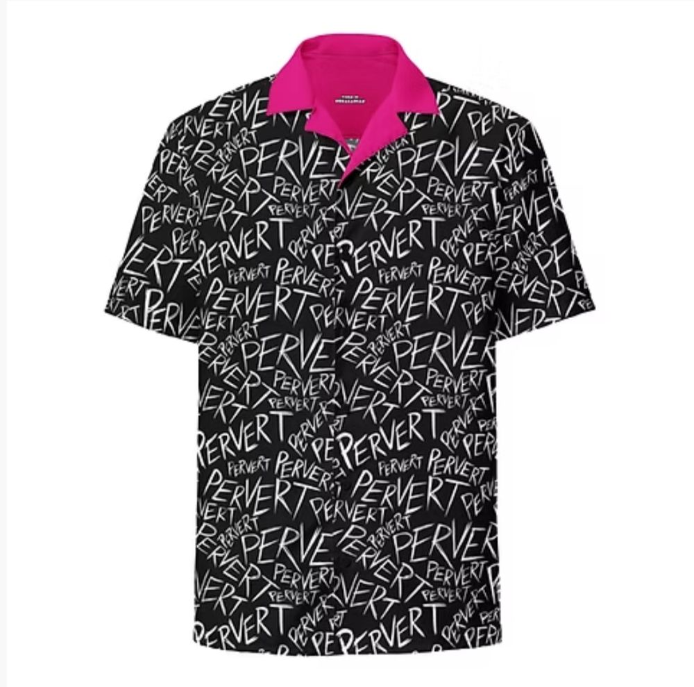 A photo of a short sleeve button up skirt that is black with the word PERVERT scrawled all over it in white handwriting