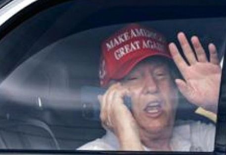An old lady tapping on glass
