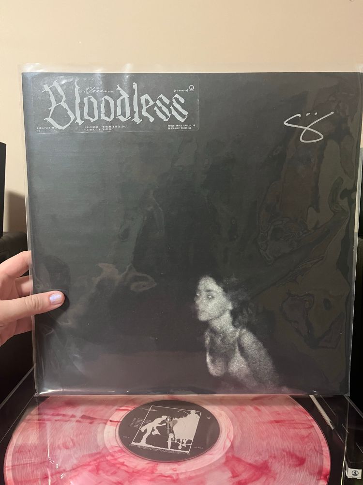 Photo of a signed record sleeve for Bloodless by Samia