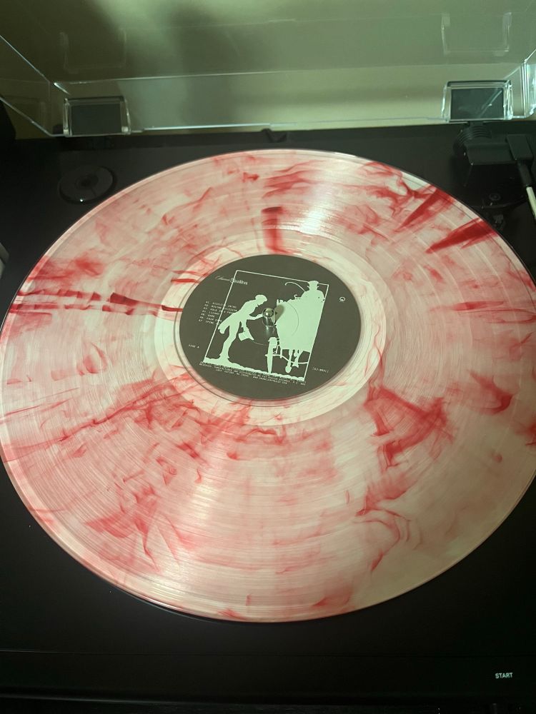Photo of Side A of "bloodshot" exclusive variant vinyl record Bloodshot by Samia 