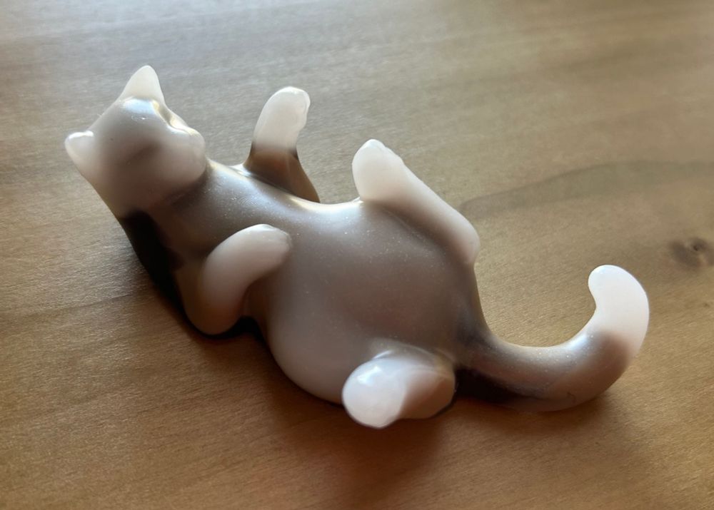 Platinum silicone cat squish with coffee color scheme made by Creature Feature Toys