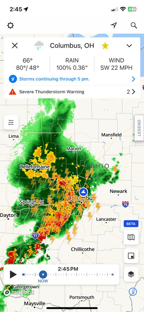 A weather map showing central Ohio; there is a huge storm front to the west, with lots of lightning icons on it