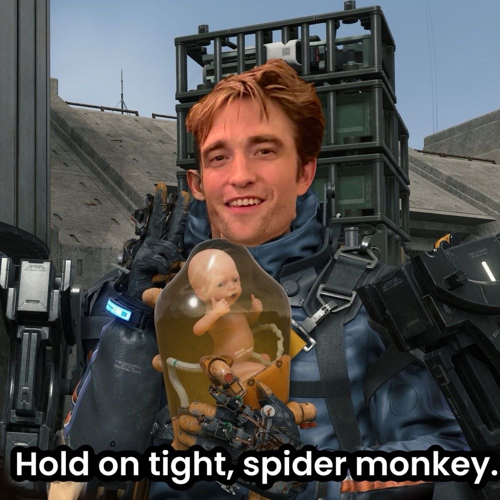 Robert Pattinson's head from OP photo superimposed on protagonist's head from Death Stranding. BB is a baby in a container on protagonist's chest, giving two thumbs up. Subtitle below picture reads "Hold on tight, spider monkey"