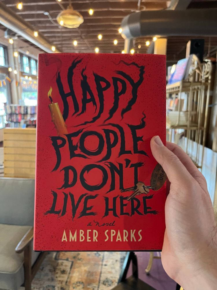 A photo of Amber Sparks’ newest novel, Happy People Don’t Live Here taken at Cavalier House Books in Lafayette, LA.