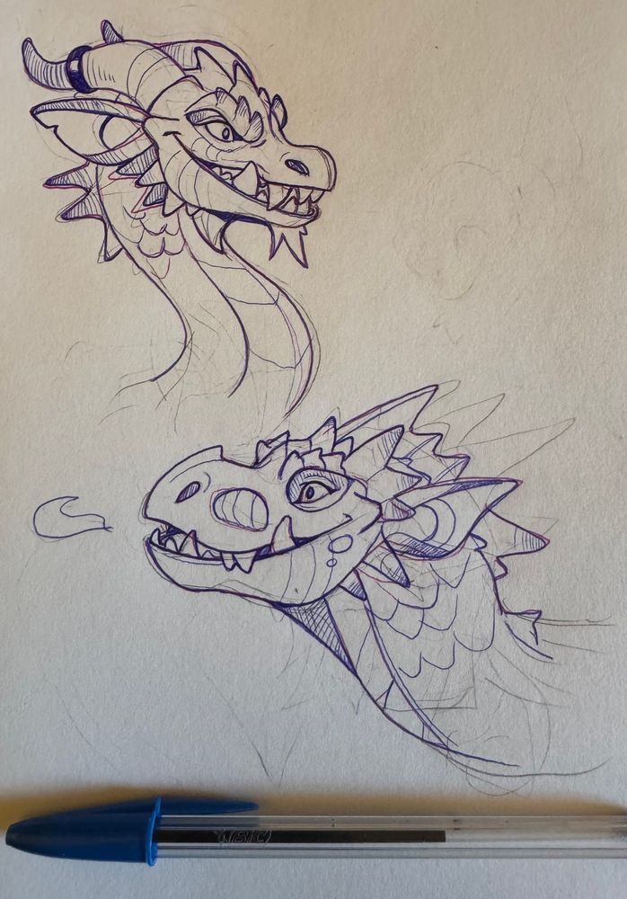 Ink drawing of two dragon heads