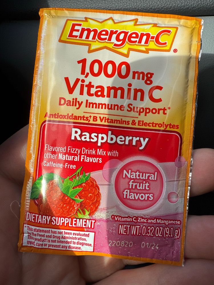 A packet of raspberry flavored Emergen-C fizzy drink mix