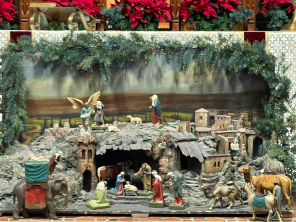 19th century Italian crèche with lovely carved figures. The magi and their entourage are especially delightful 