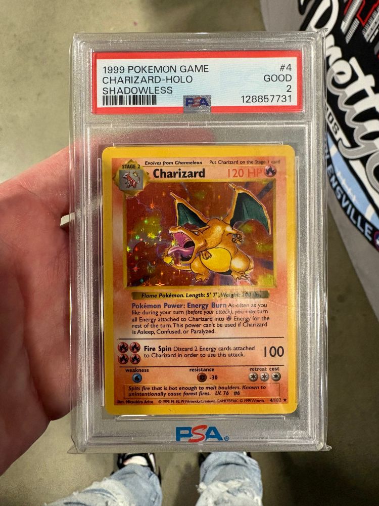 Base set shadowless 99 charizard card grade 2 