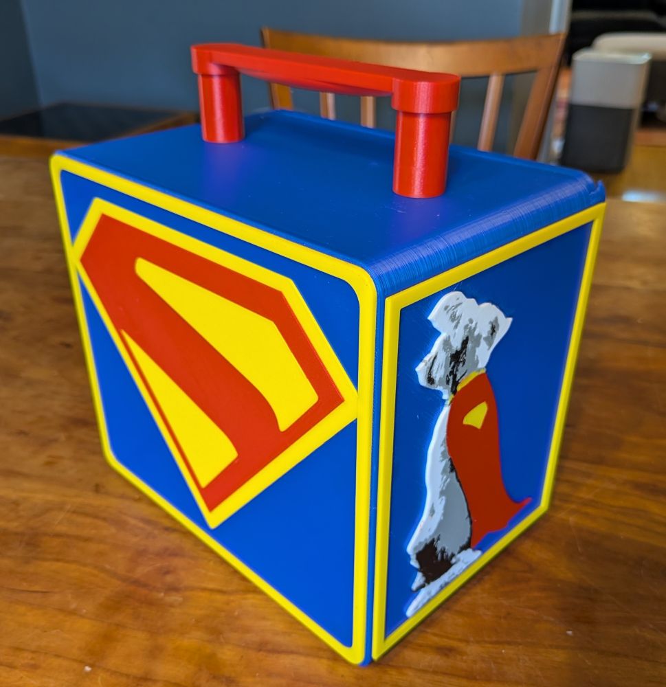 Heroclix case with new Superman logo and Kypto from the film