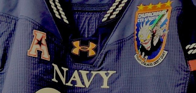 Close up of Navy football jersey with Chupacabras patch.