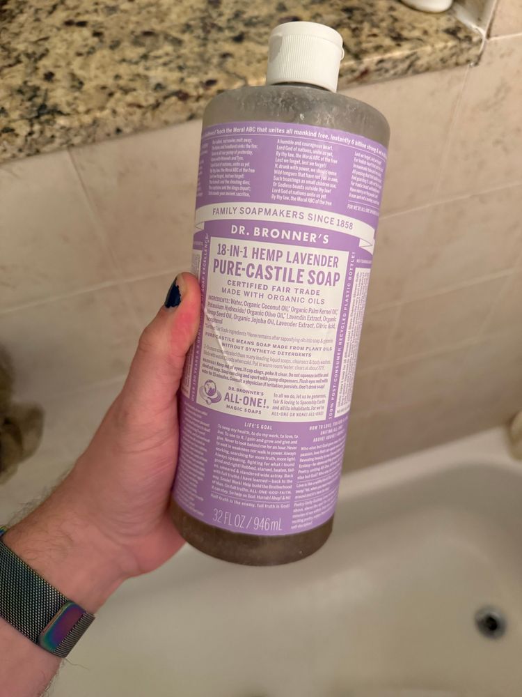 A 1 L bottle of Dr. Bronner’s soap showing the religious text on the outside