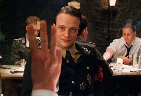 "man holdin up 3 fingers" meme from the film inglorious basterds