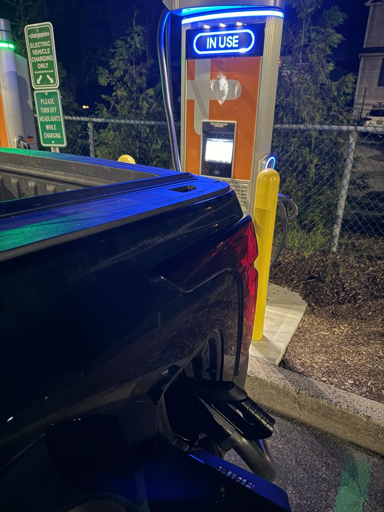 Pickup backed into a charge point location 
