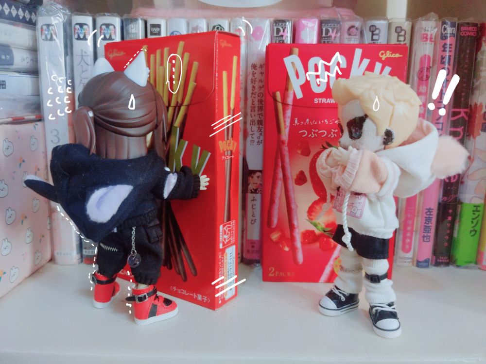 same dolls. jay is moving one box by himself, darby is watching.