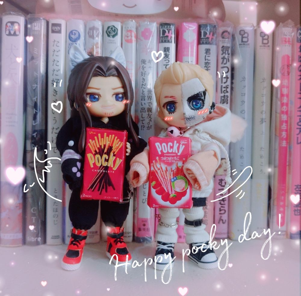 jay and darby holding custom miniature pocky boxes.