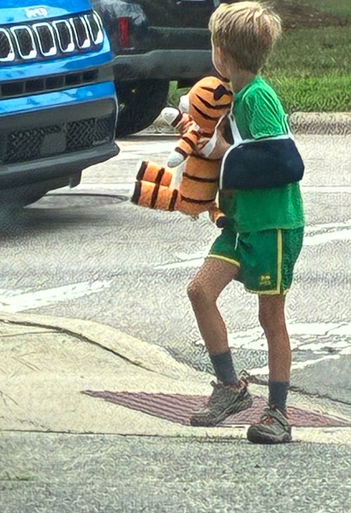 blonde kid with tiger