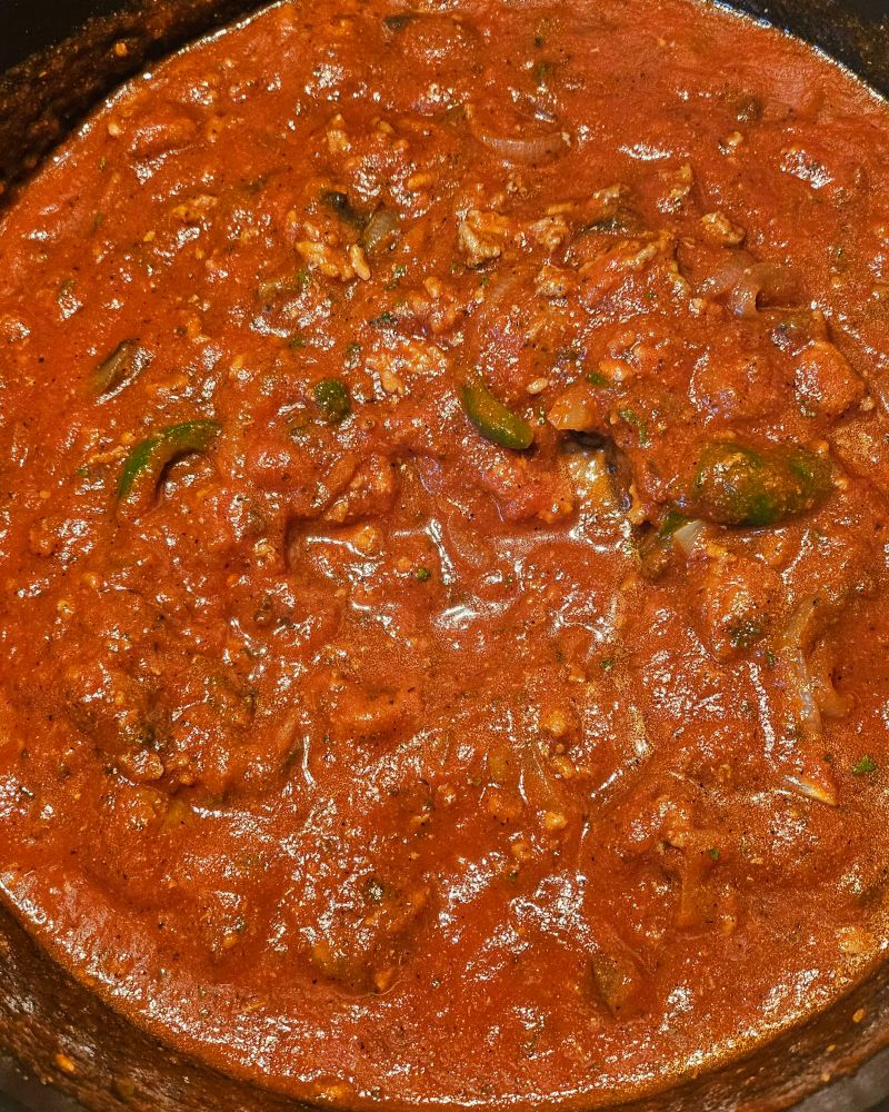 Spaghetti sauce with veggies, ground pork, beef, and Italian sausage added. 