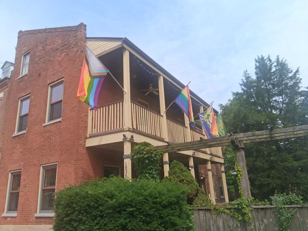 Flounder house with Gay Pride flags.