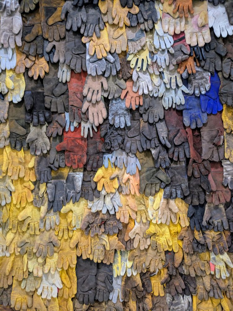 A colourful display of various work gloves