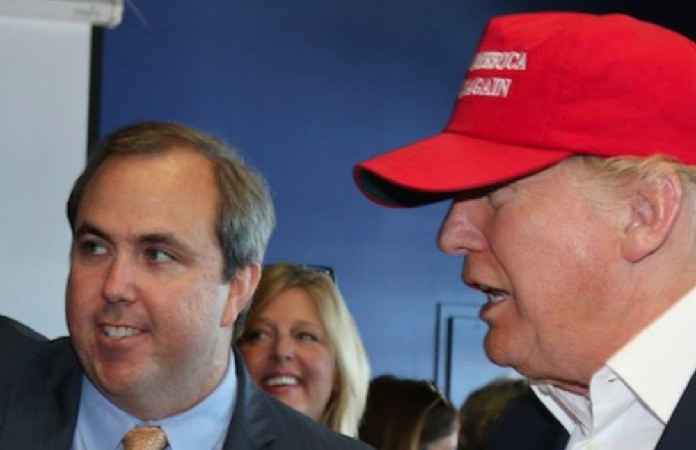 Florida Republican Party chairman Joe Gruters dismissed accusations of racism after video surfaced Tuesday showing him talking with a migrant child while leaning against "Faces of Criminal Illegals" w...