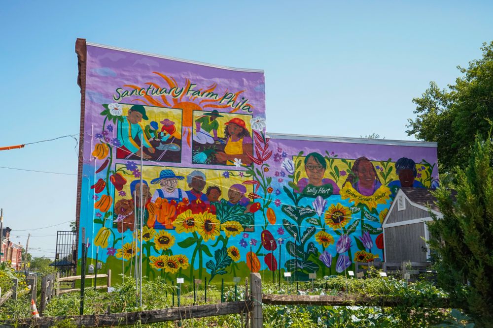 The finished mural designed by Cindy Lozito for Sanctuary Farm in Sharswood, Philadelphia