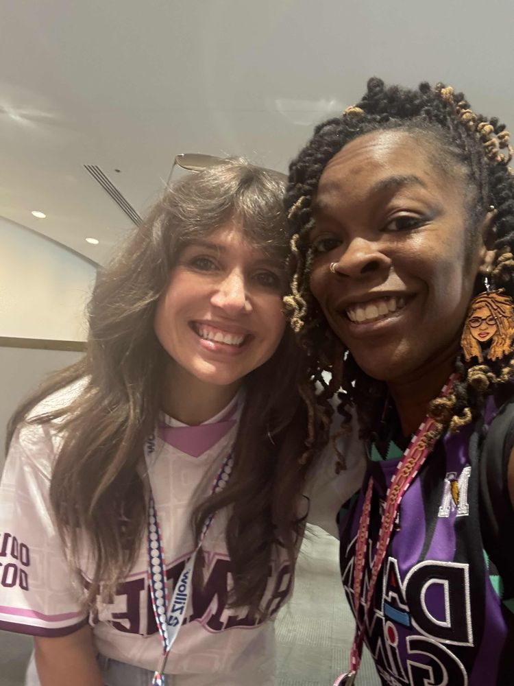 Two women smiling at the camera