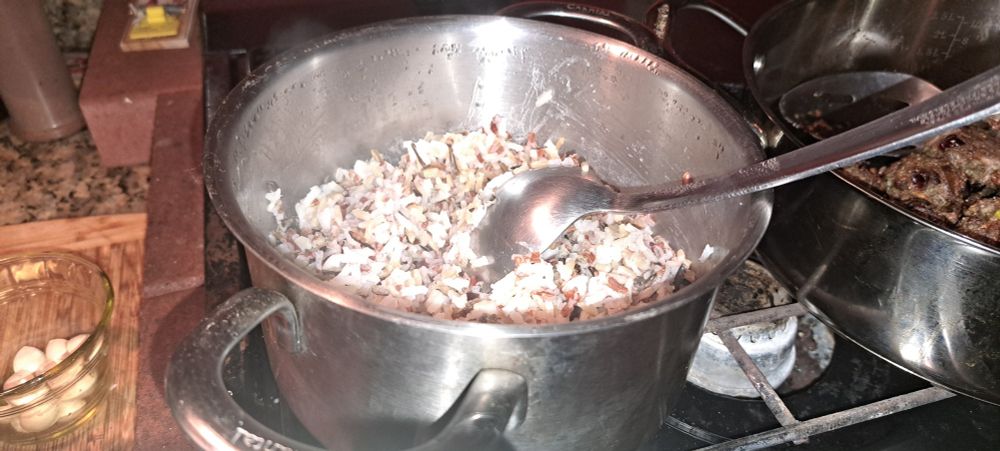 Blend of wild, white, brown, and red rice cooked and ready to eat.