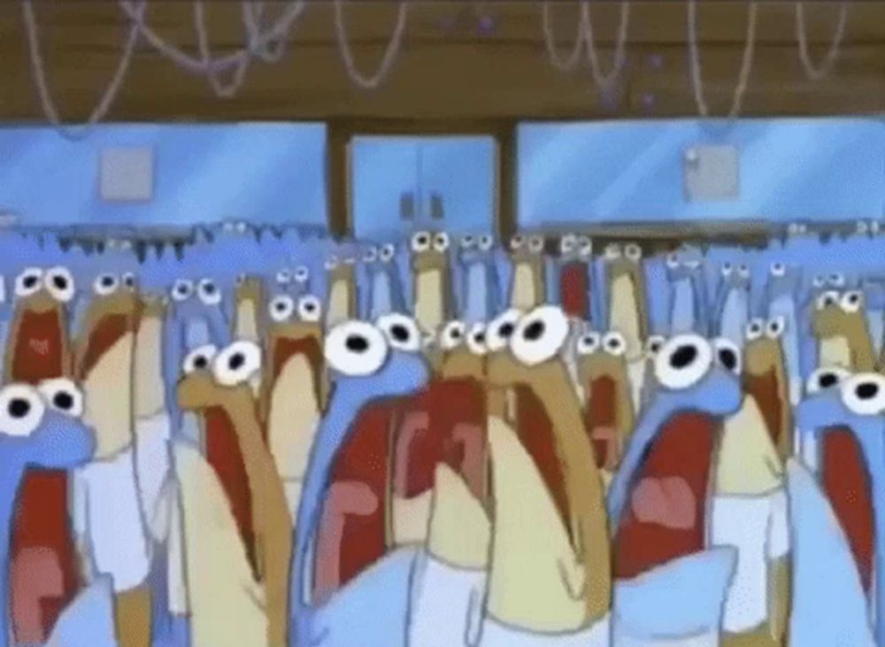 a group of cartoon characters are standing next to each other with their mouths wide open .