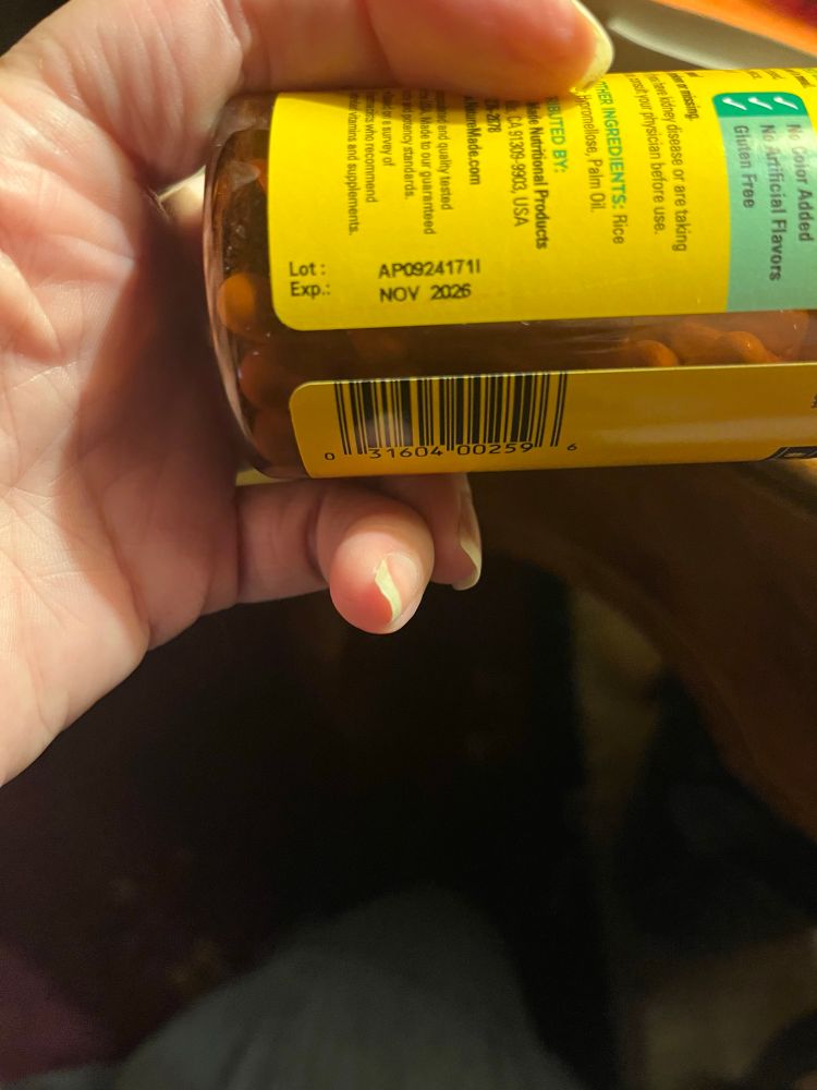 Bottle of vitamins showing lot number