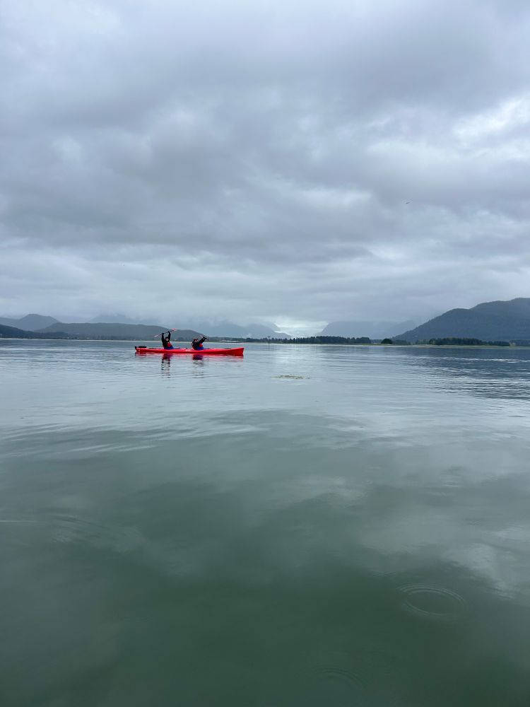 me & jov in a tandem kayak in front of a glacier! 