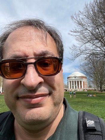 Mid selfie of me on UVA Lawn with Rotunda over my shoulder. 