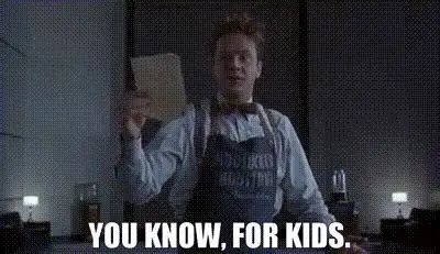 Bild aus dem Film Hudsucker Proxy. Tim Robins hält einen Zettel hoch. Darunter steht "You know, for kids"