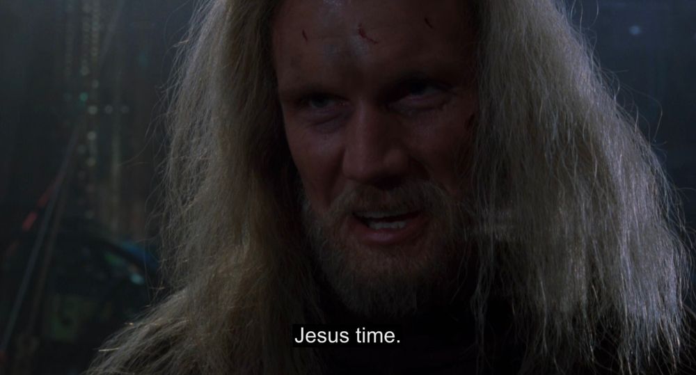 A scary guy with long hair with the subtitle "Jesus time."