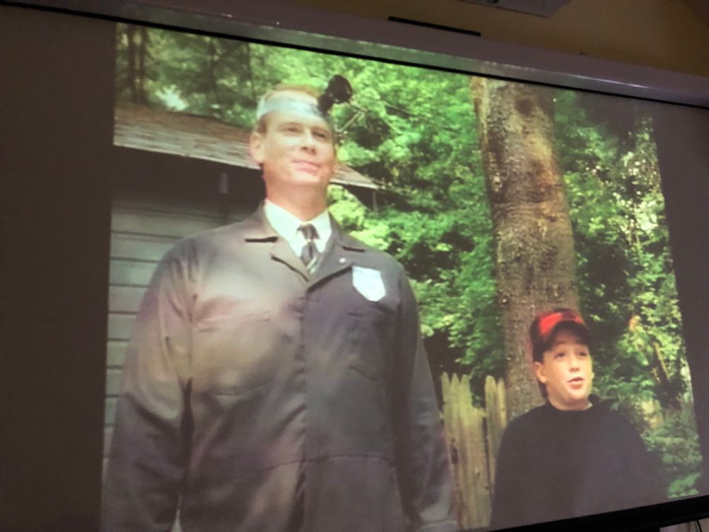 Freeze frame of little Pete and Inspector 34 from the 90s show Pete and Pete. 