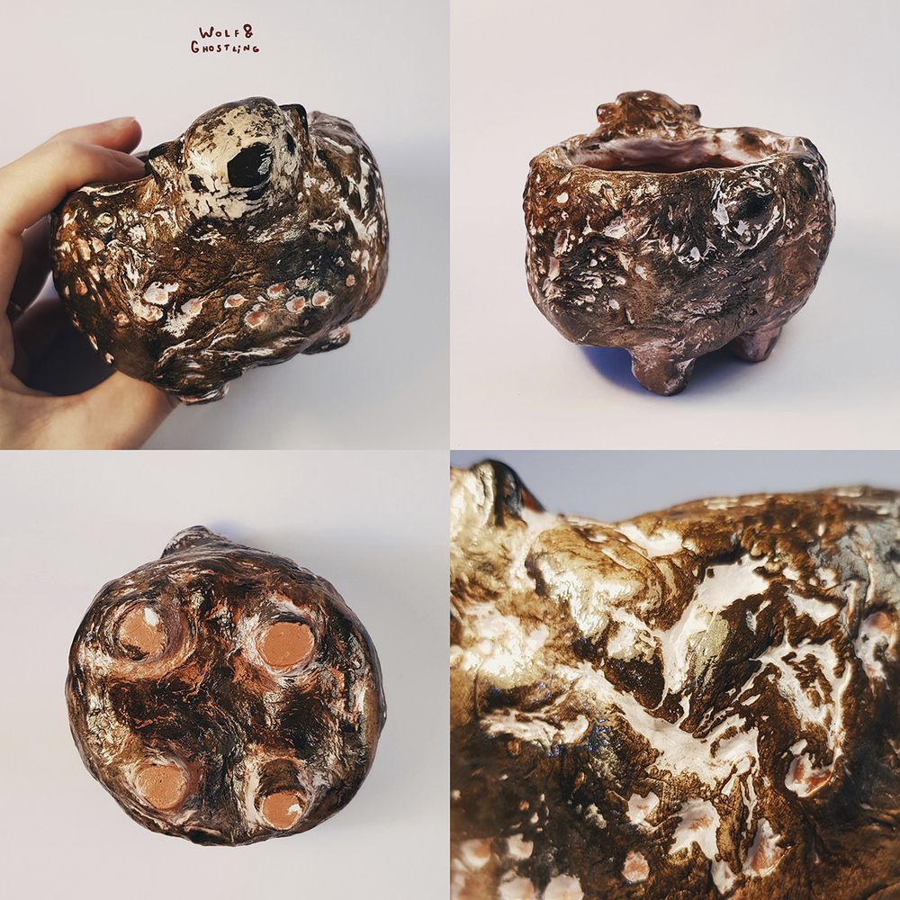 a handmade succulent plant pot in the shape of a bear