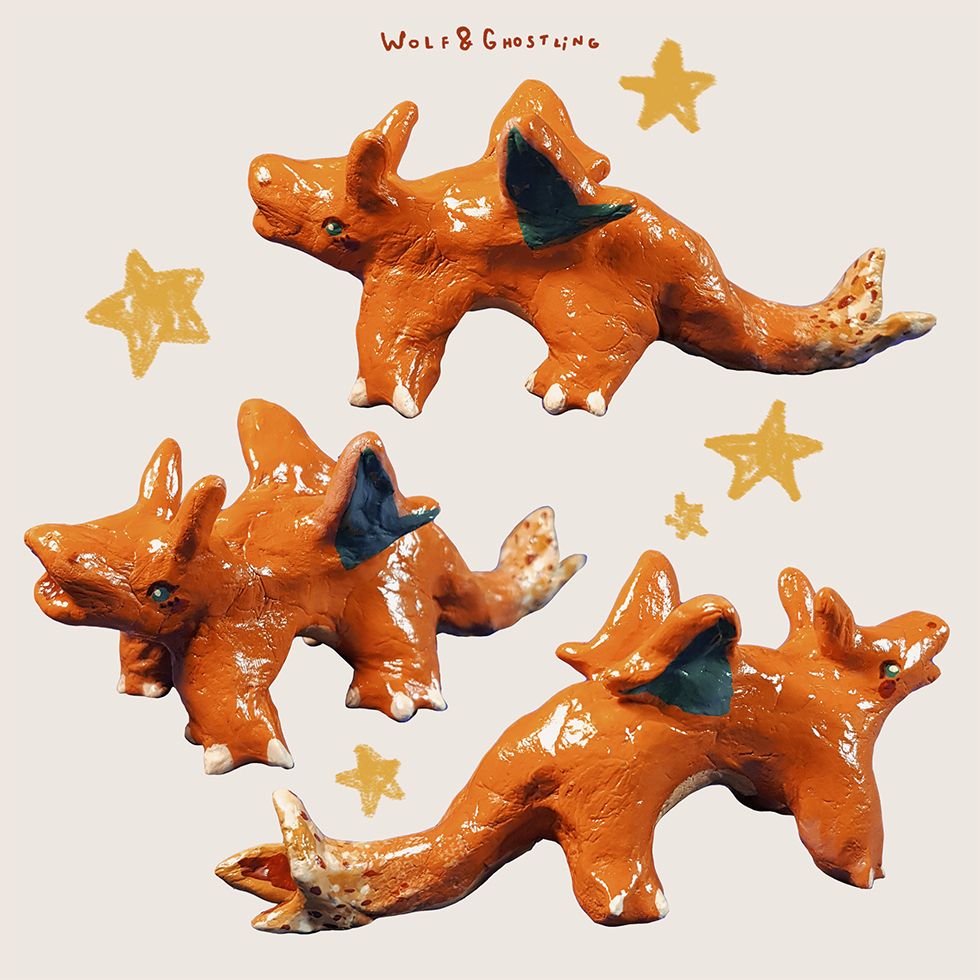 three angles showcasing a chunky, glossy sculpture of the pokemon charizard, surrounded by yellow scribbled stars.