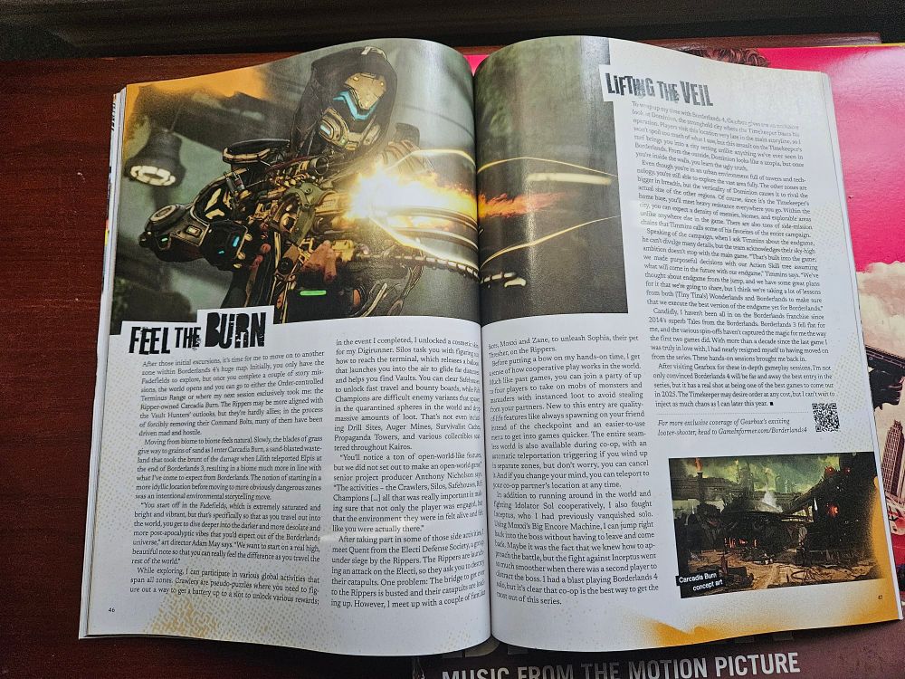 An open issue of Game Informer showing a mix of atmospheric and action shots from the new Borderlands, alongside the text of the write-up.