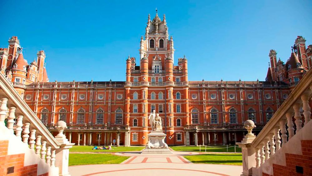 photograph of one of the two grand courtyards of Royal Holloway's Founders Building, with sculpture of Thomas and Jane Holloway.